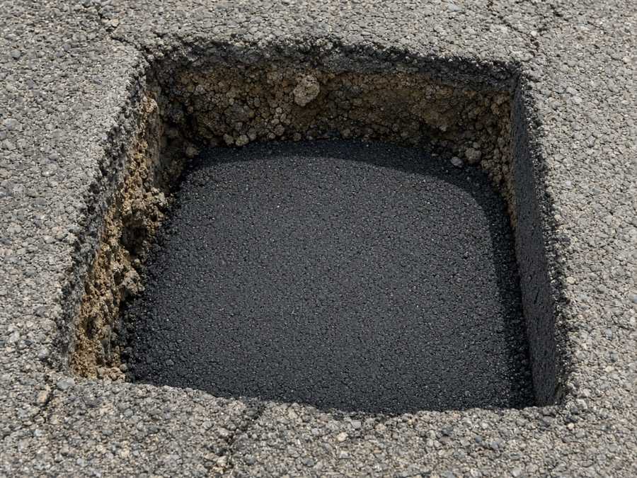 Saw-cut full-depth patch opening before fill — Asphalt Repair & Patching in Riverside, CA